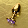 Анальная втулка Metal by TOYFA, металл, золотая, с фиолетовым кристаллом, 7 см,  2,7 см, 50 г